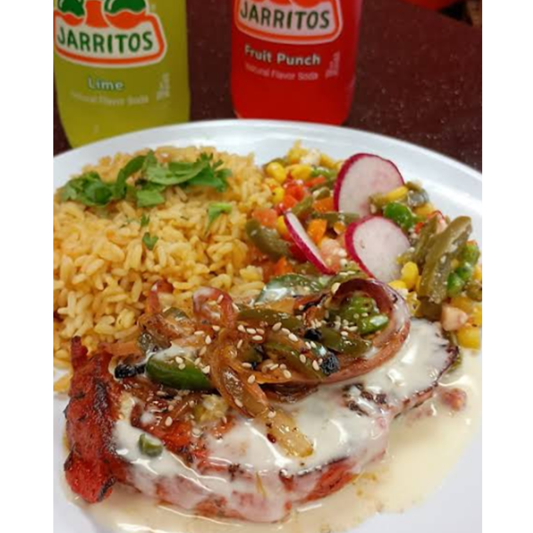 mexican food plate with rice and jarritos